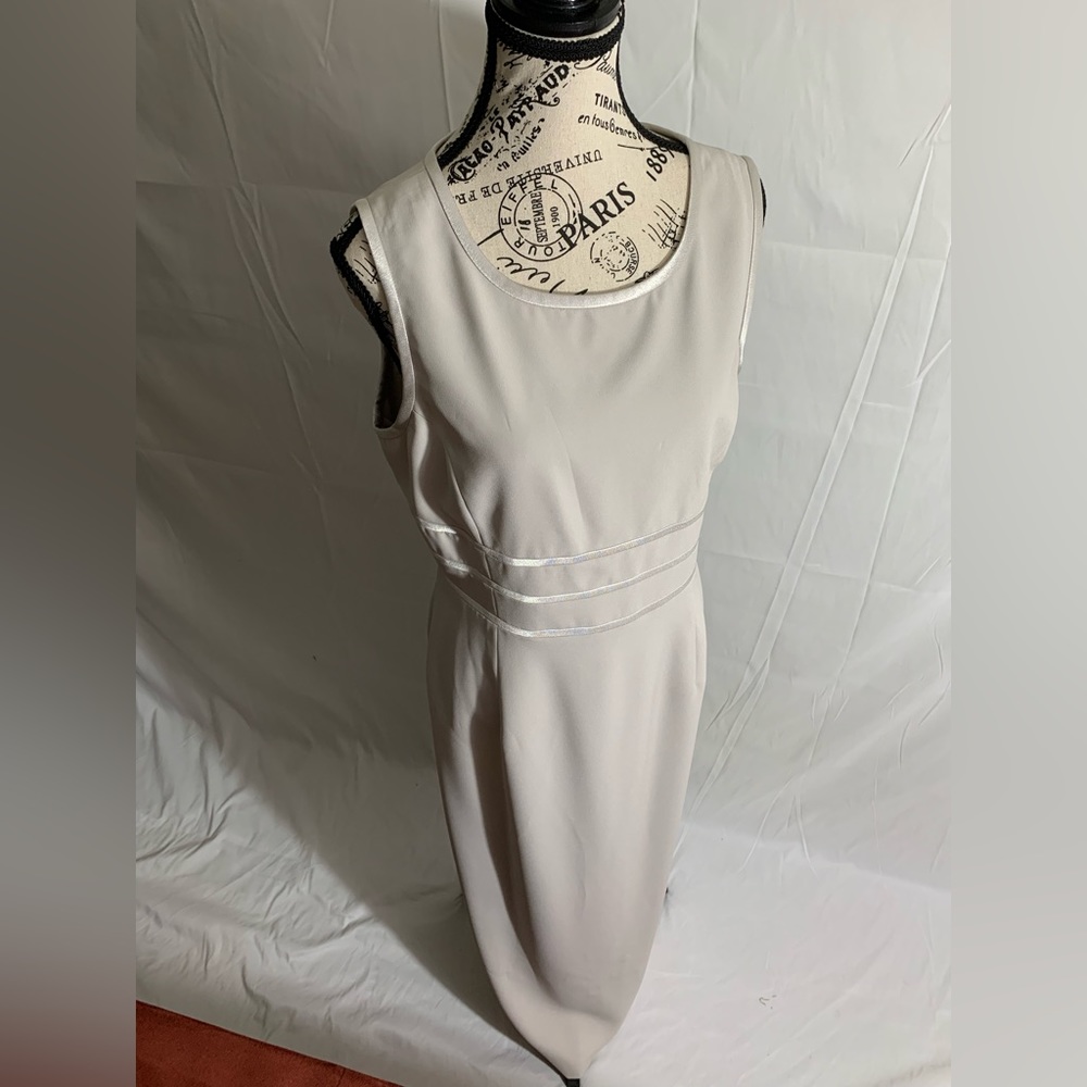 NWOT- Chadwick Papell Silver gown straight peep a poo triangle cutouts. Sz:16